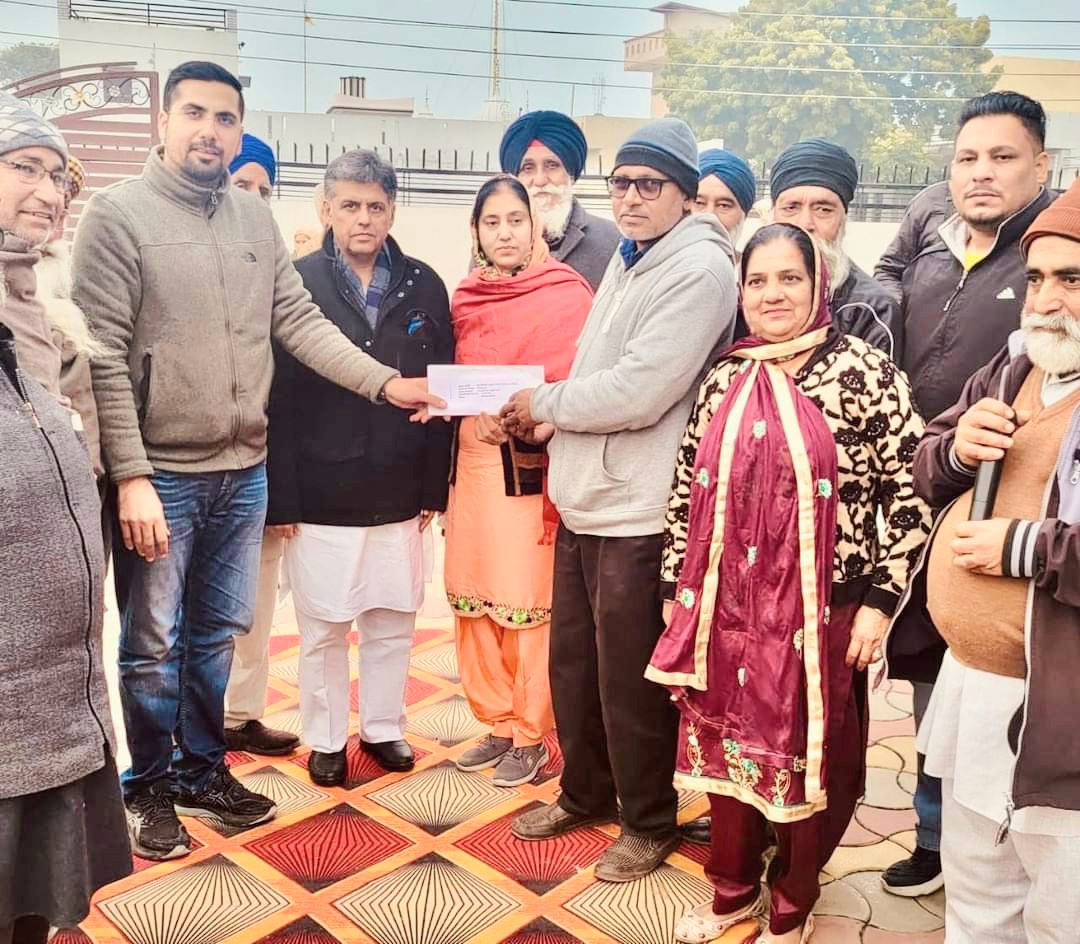 Lok Sabha member Manish Tiwari distributed checks to various villages for development works